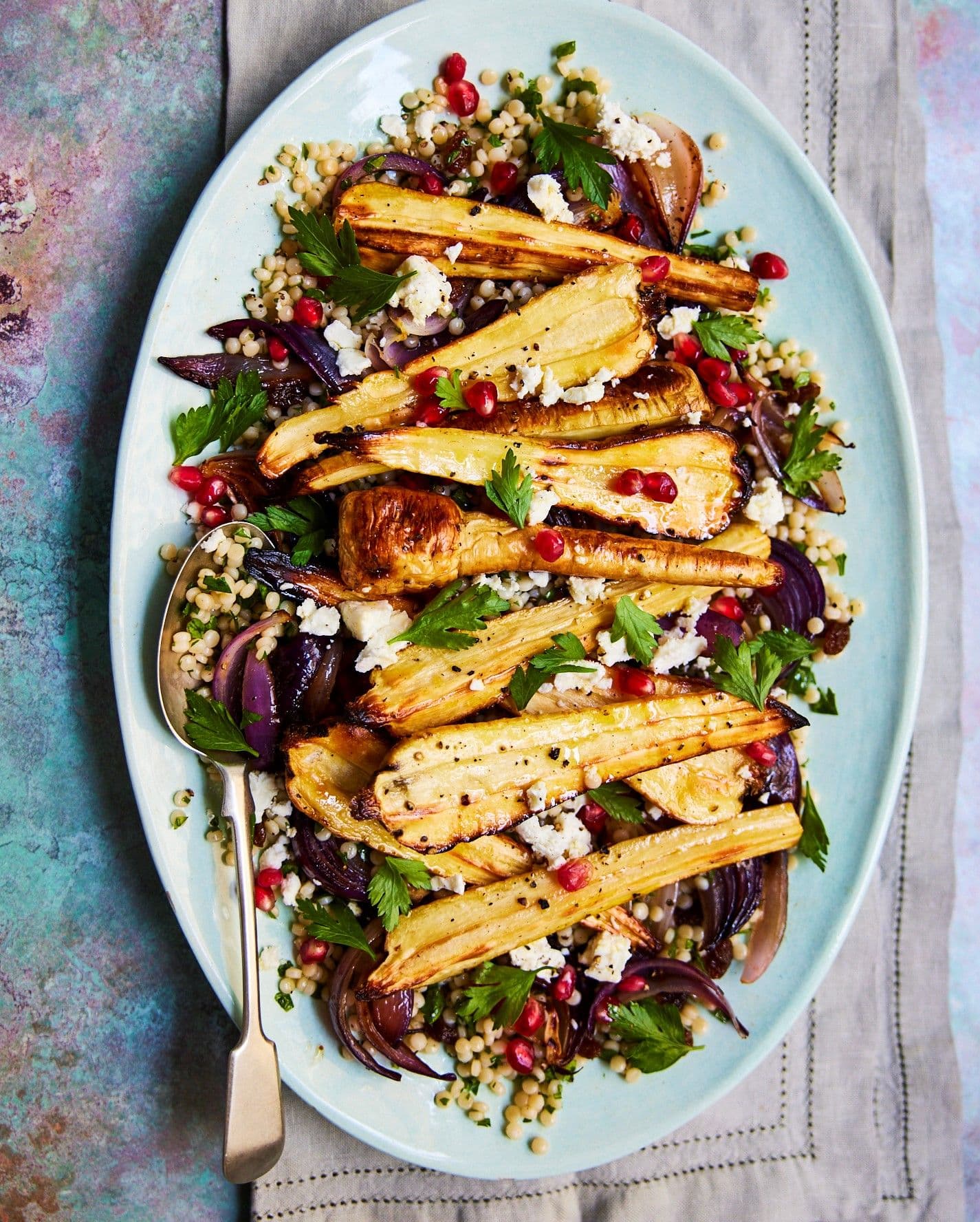 Roasted parsnips with giant couscous salad, roasted red onion and parsley