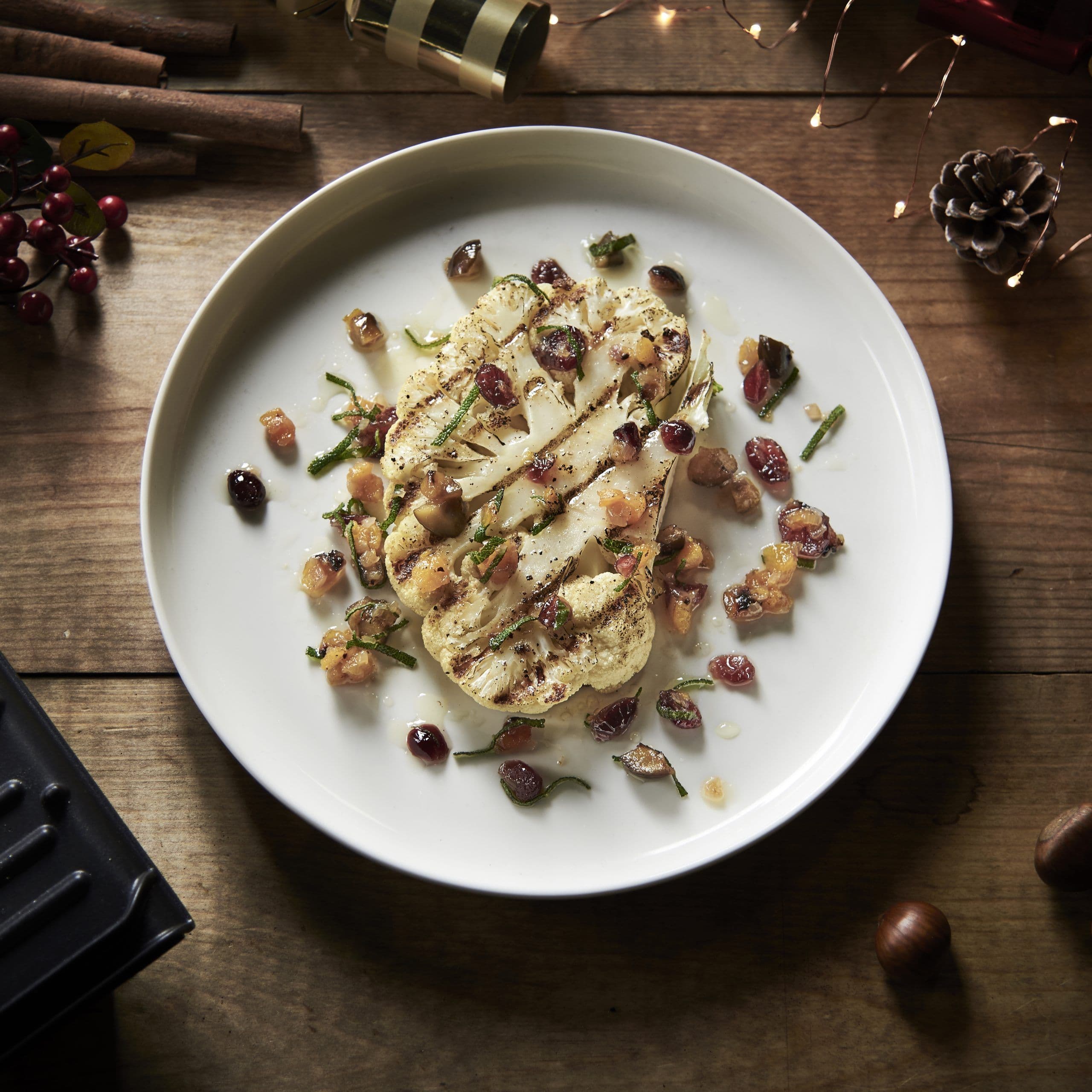 Cauliflower steak with a warm chestnut, cranberry and sage dressing