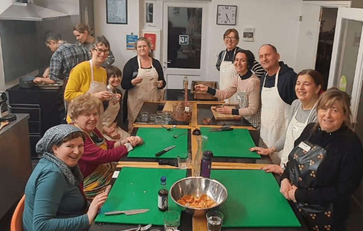 Picture of the participants smiling before cooking